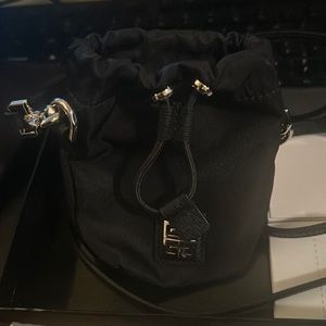 Brand new authentic never worn micro mini crossbody..